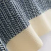 Strickad polotröja med strukturerade ränder