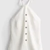 Strukturerad halterneck-top med knappar