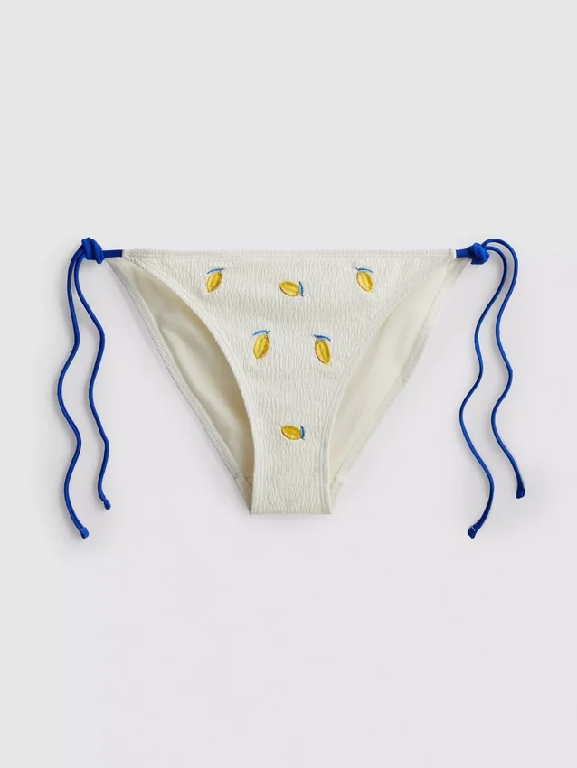 Strukturerade bikinibottnar i citrongult med knytband i sidorna