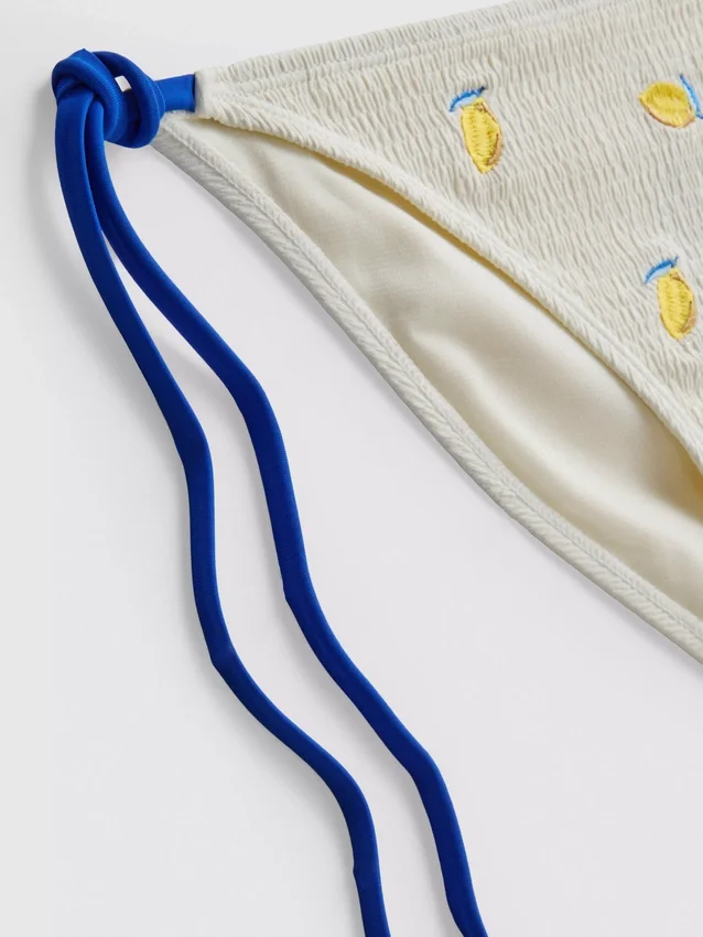 Strukturerade bikinibottnar i citrongult med knytband i sidorna