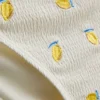 Strukturerade bikinibottnar i citrongult med knytband i sidorna