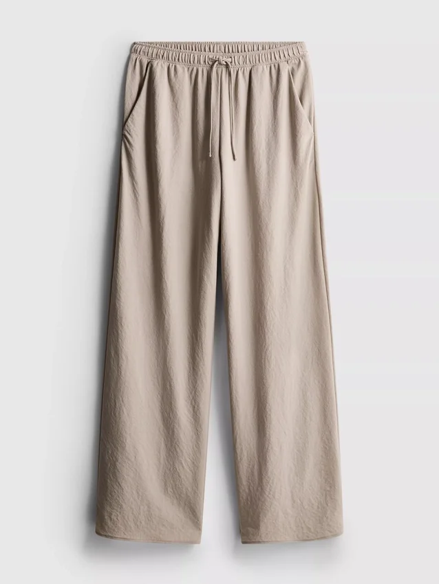 Strukturerade byxor med vida ben