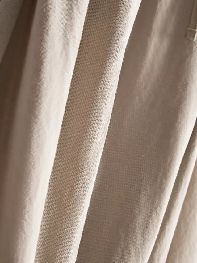 Strukturerade byxor med vida ben