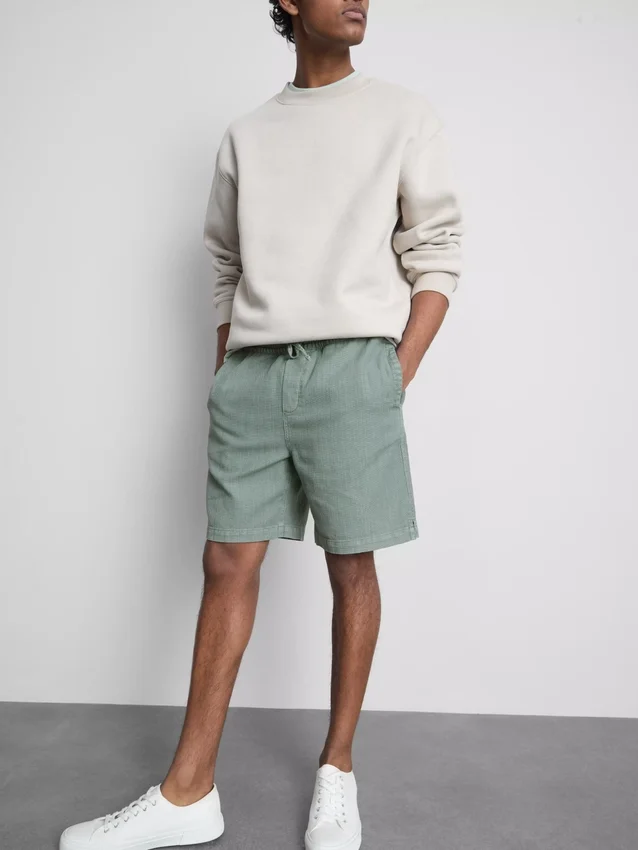 Strukturerade shorts med dragsko