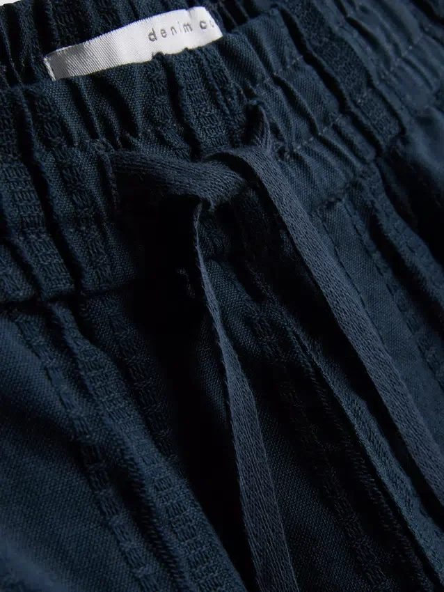 Strukturerade shorts med dragsko