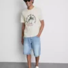 T-shirt med Paradise Beach-motiv