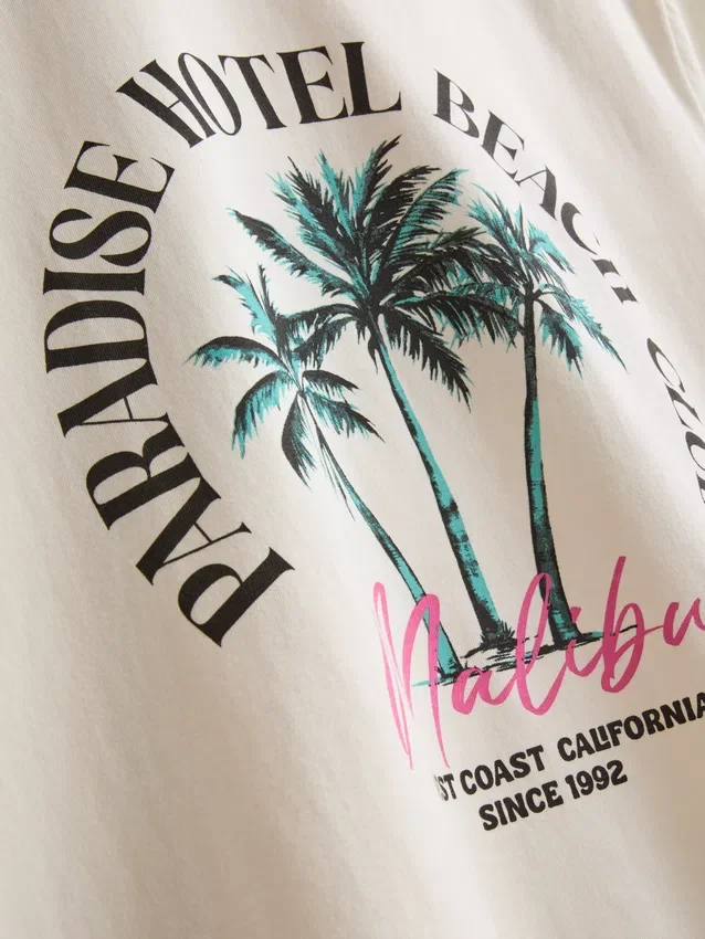 T-shirt med Paradise Beach-motiv