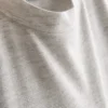 T-shirt med påsydd ficka och förlängd passform
