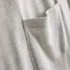 T-shirt med påsydd ficka och förlängd passform