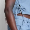 Tanktop i bomullsdenim med knytband i sidorna