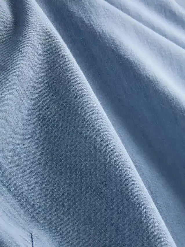 Tanktop i bomullsdenim med knytband i sidorna