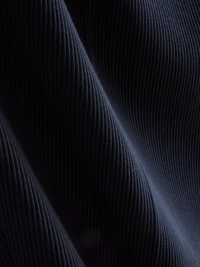 The Edit plissérade byxor