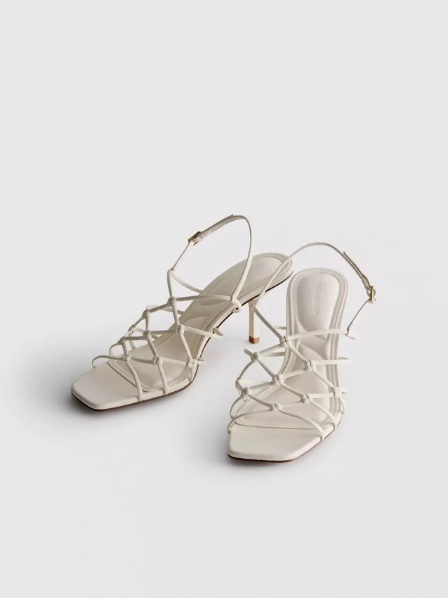 The Edit-sandaler med flätad stilettklack