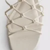 The Edit-sandaler med flätad stilettklack
