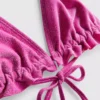 Triangelbikiniöverdel med glittrande volanger