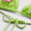 Triangelbikiniöverdel med pärlbesatta blommor