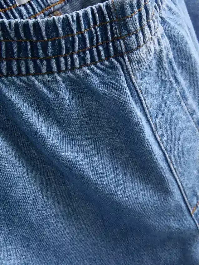 Träningsbyxor i bomullsdenim med vida ben