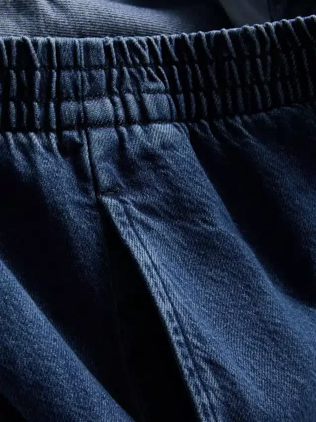 Träningsbyxor i bomullsdenim med vida ben