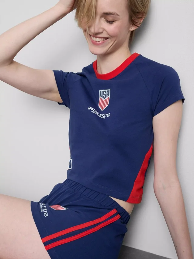 USA-fotbollspyjamasar med korta byxor