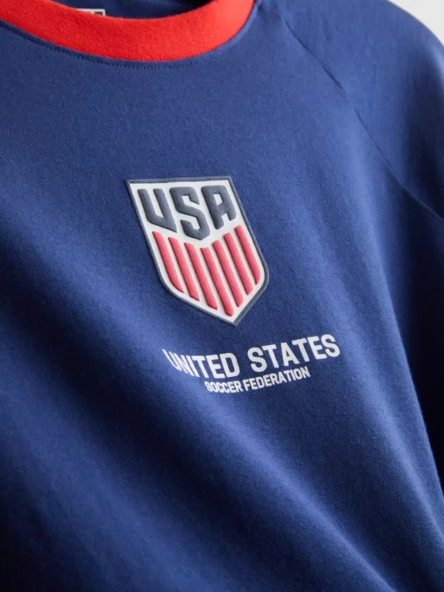 USA-fotbollspyjamasar med korta byxor