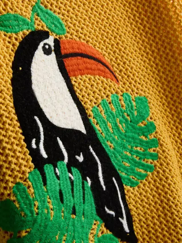 Virkad och broderad strandminiklänning