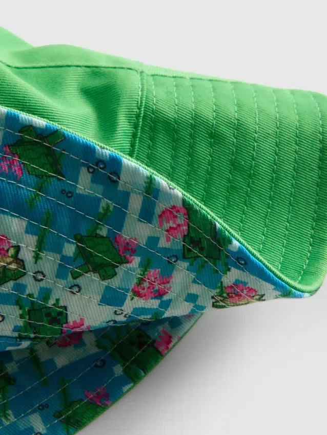Vändbar bucket-hatt med Minecraft-motiv