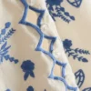 Väst i bomull med blommigt broderi