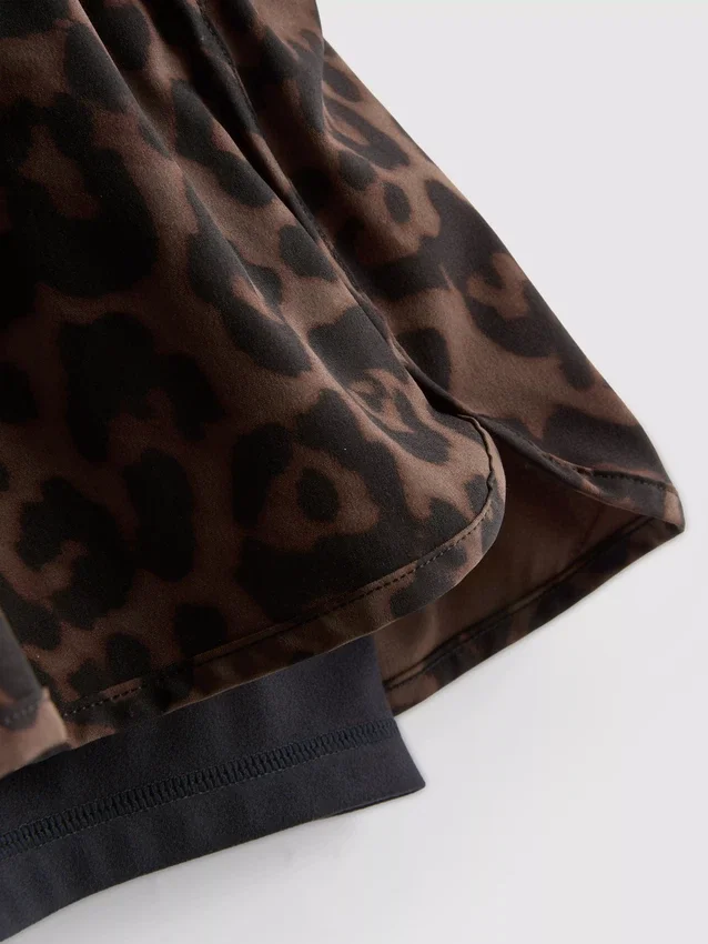 Vävda löparshorts med leopardmönster