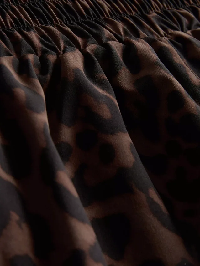 Vävda löparshorts med leopardmönster